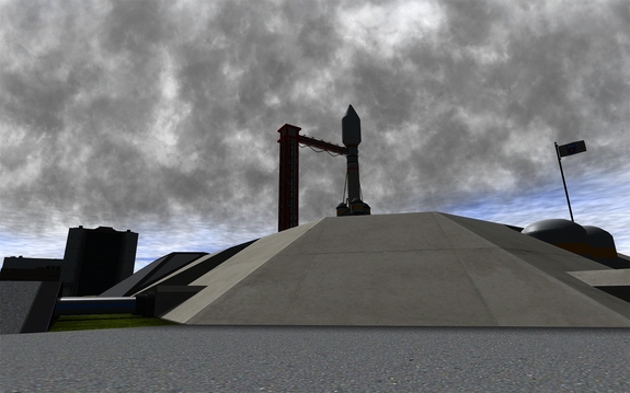 here is Mu-SCAN on the pad. Some blue skies trying to break through the cloud cover. Weather remains red