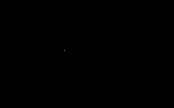 356,777km from Duna, we can just barely see ice caps in this hi-res image. Ike is above, Jool to the left 